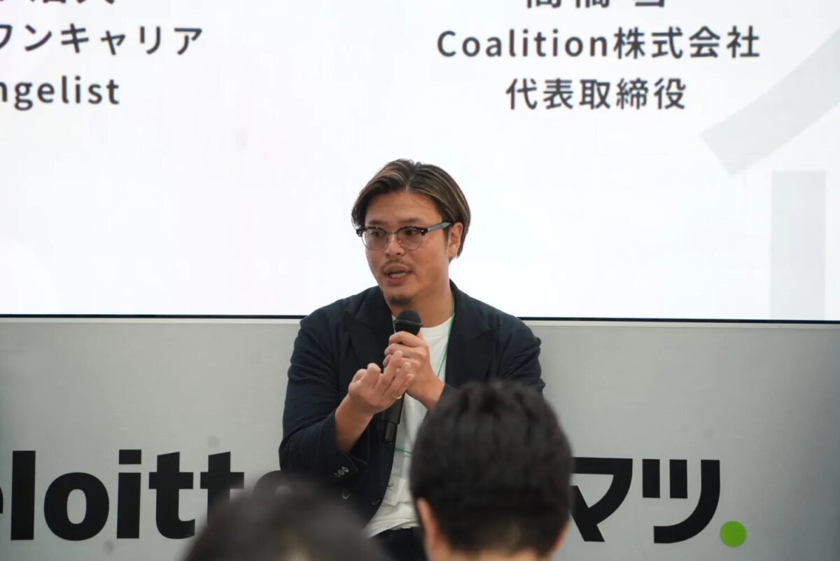 登壇する代表取締役の高橋
